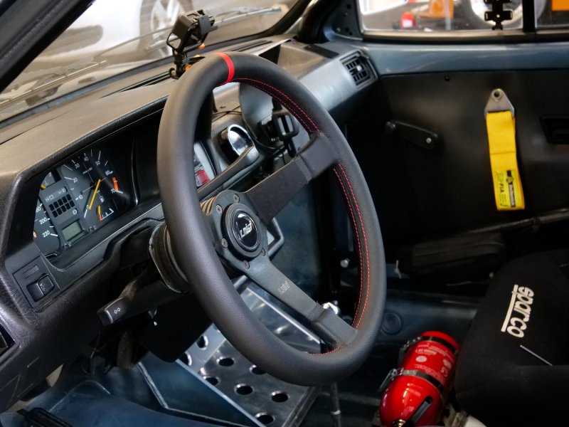 Preview: Luisi Mirage Corsa Sportlenkrad Leder schwarz / rot geschüsselt & TÜV Prüfbericht